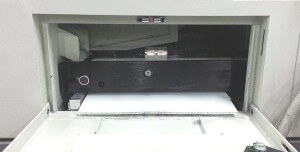 Lite series conveyor in Swiss lathe - side door view