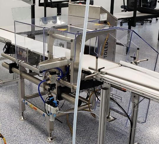 Check-Weighing System with LP Series Mini-Mover Conveyor 