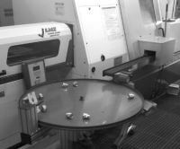 Mini-Mover RTA Rotary Table Accumulator and Lite Series Conveyor for Machined Parts Unloading