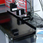 LP Series Mini-Mover conveyor used in dual-head ink jet print system