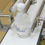 LP Series Mini-Mover conveyor with double rail attachment for bottle capping operation