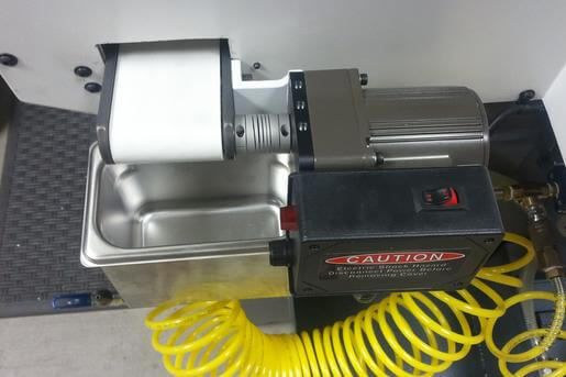 Parts Catcher - Mini-Mover LP Series conveyor integrated into machine