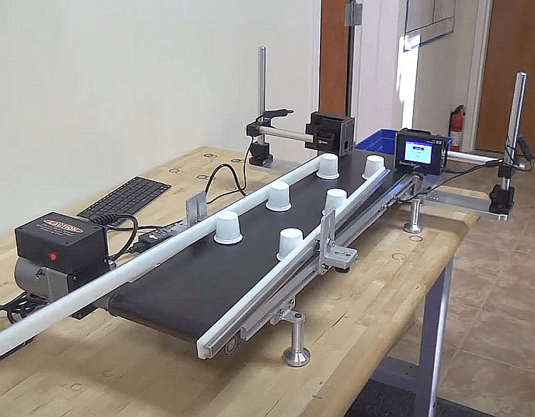 Pro Pack's Coding Systems with Mini-Mover Conveyor